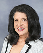 A portrait of a staff member